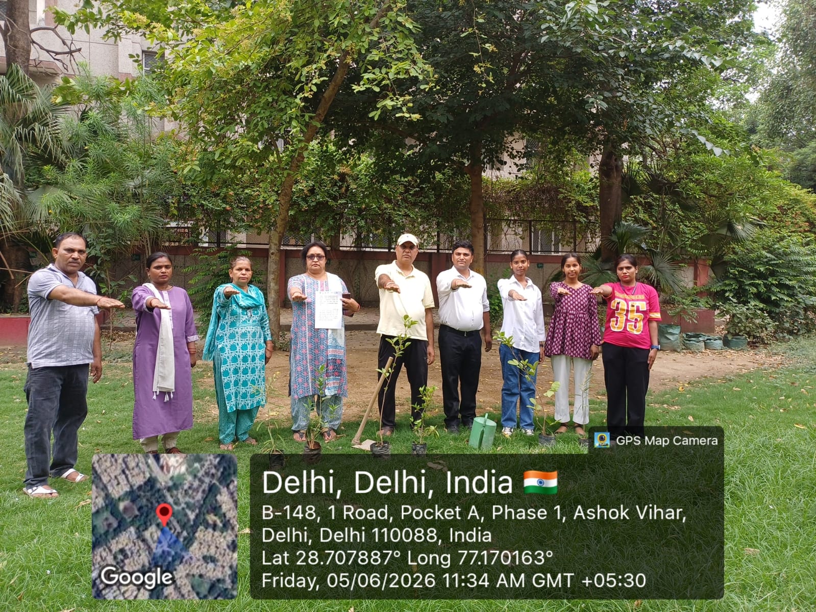 Volunteers and community members plant saplings as part of a Shikshadwar tree-plantation drive