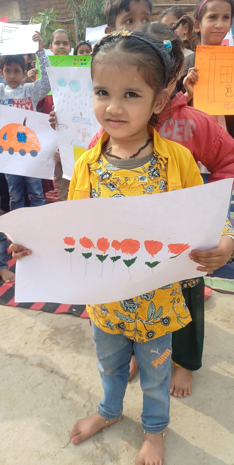 Children with their artwork at Shikshadwar